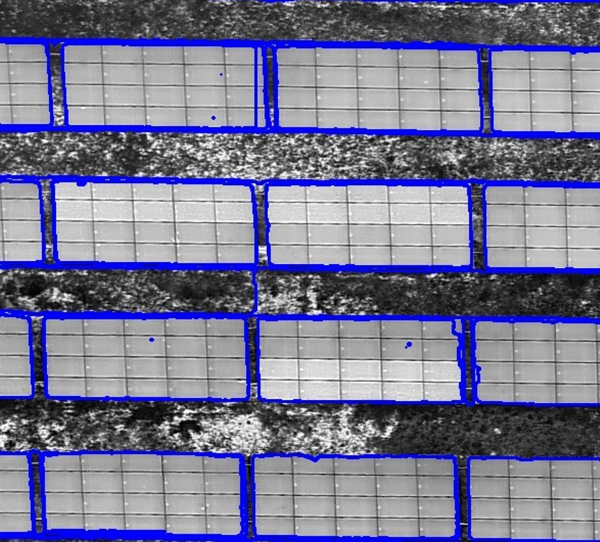 Thermal orthophoto detail with panels outlined in blue and flagged hot-spot peaks marked by dots